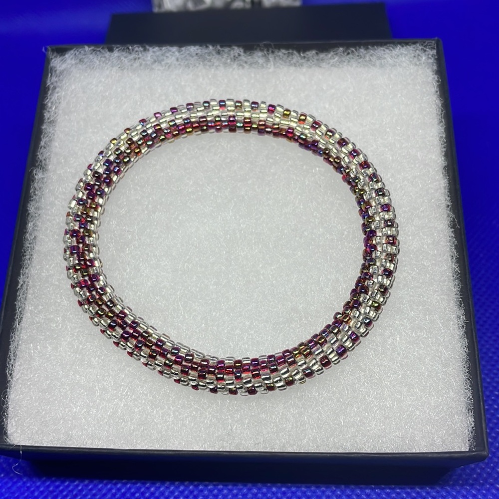 Sashka multi color stretch bracelet with box.
